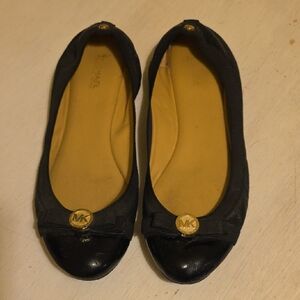 Michael Kors Black and‎ Gold Loafers